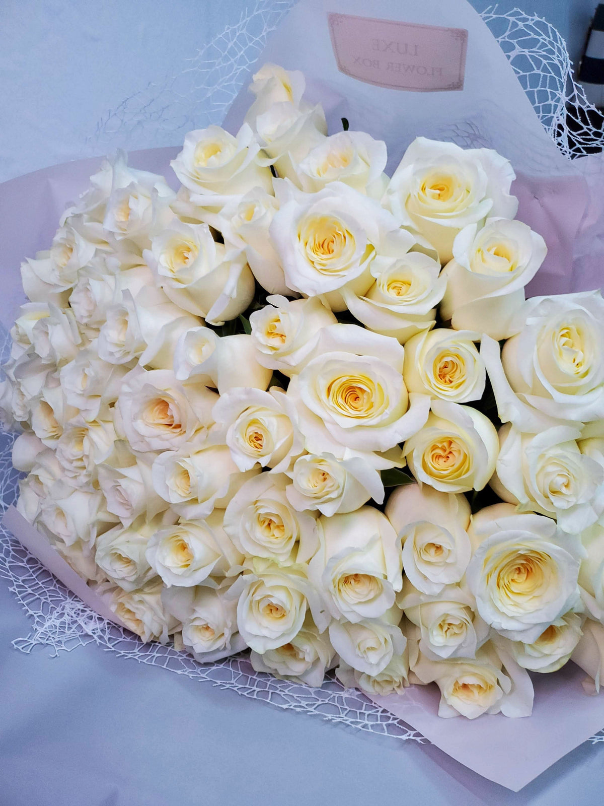 Elegant Candlelight Roses with soft, creamy petals, beautifully arranged to create a warm and romantic ambiance.